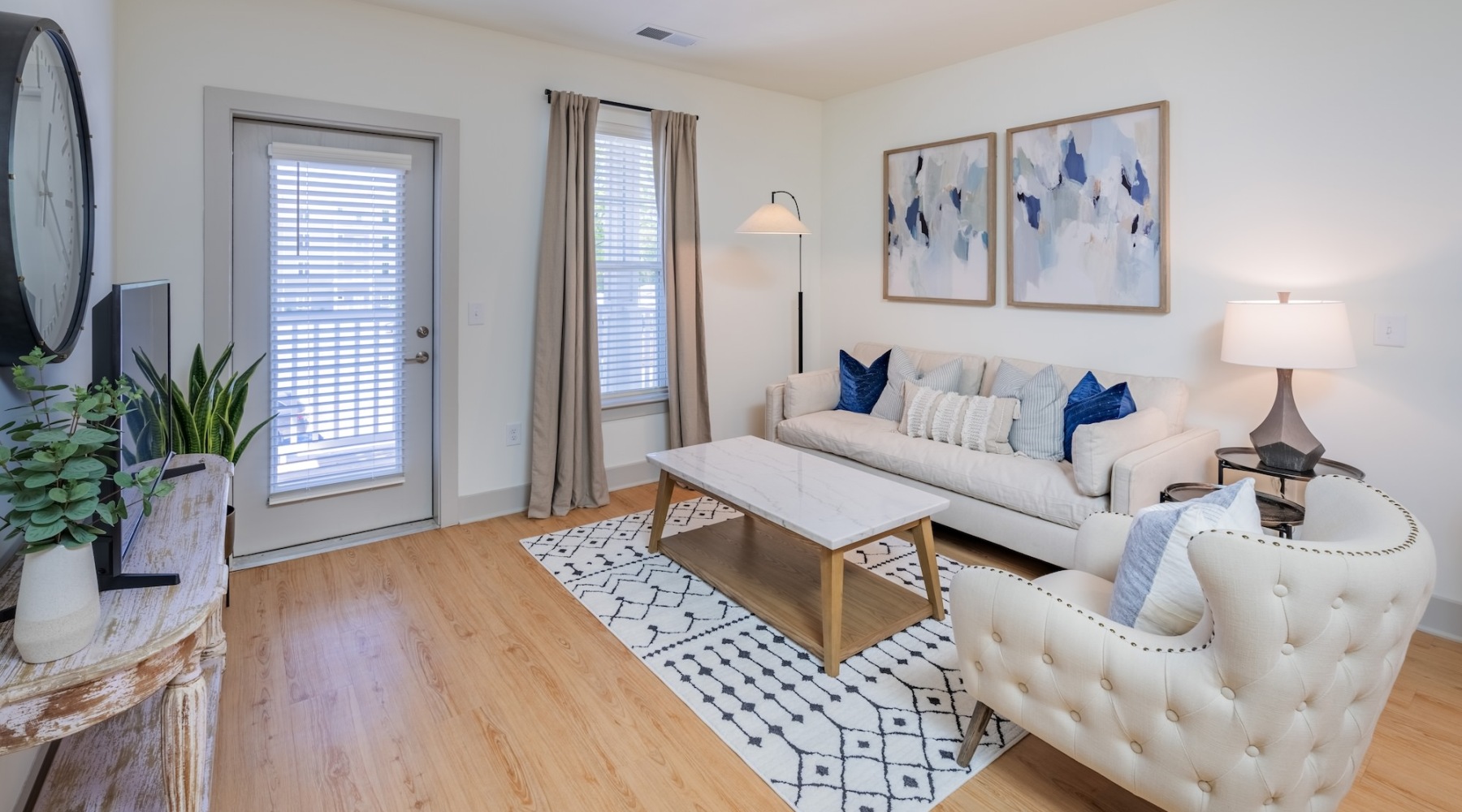 Stylish living spaces living room with a couch, chair, and coffee table