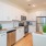 a kitchen with white cabinets