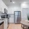 a kitchen with white cabinets