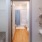 a large closet with a bathroom