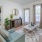 a living room with a couch and a table