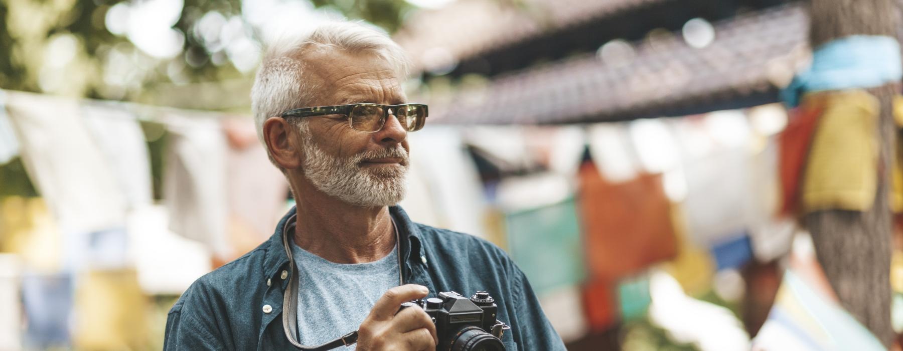 a man holding a camera