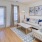a living room with a couch and a table