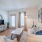 a living room with a couch and a tv